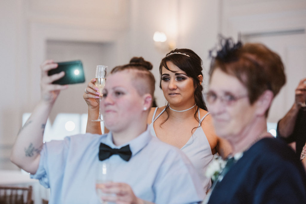 The bride's daughter cries during the wedding speeches