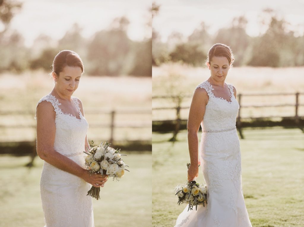 Surrey bride looking down holding her bouquet