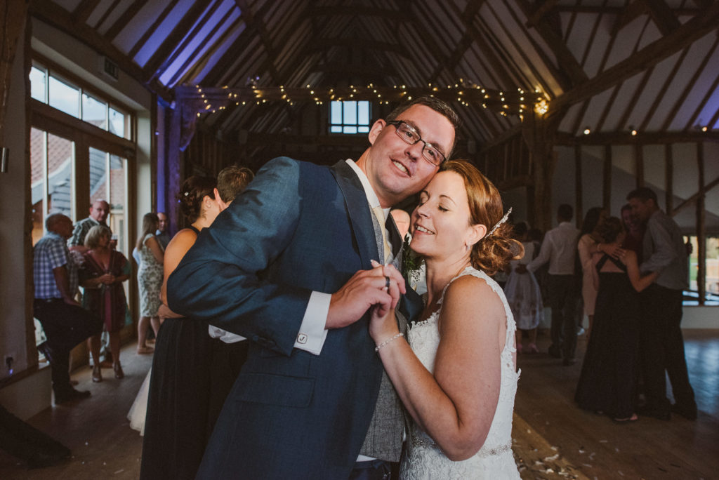 bride and groom are very happy and relaxed during their first dance