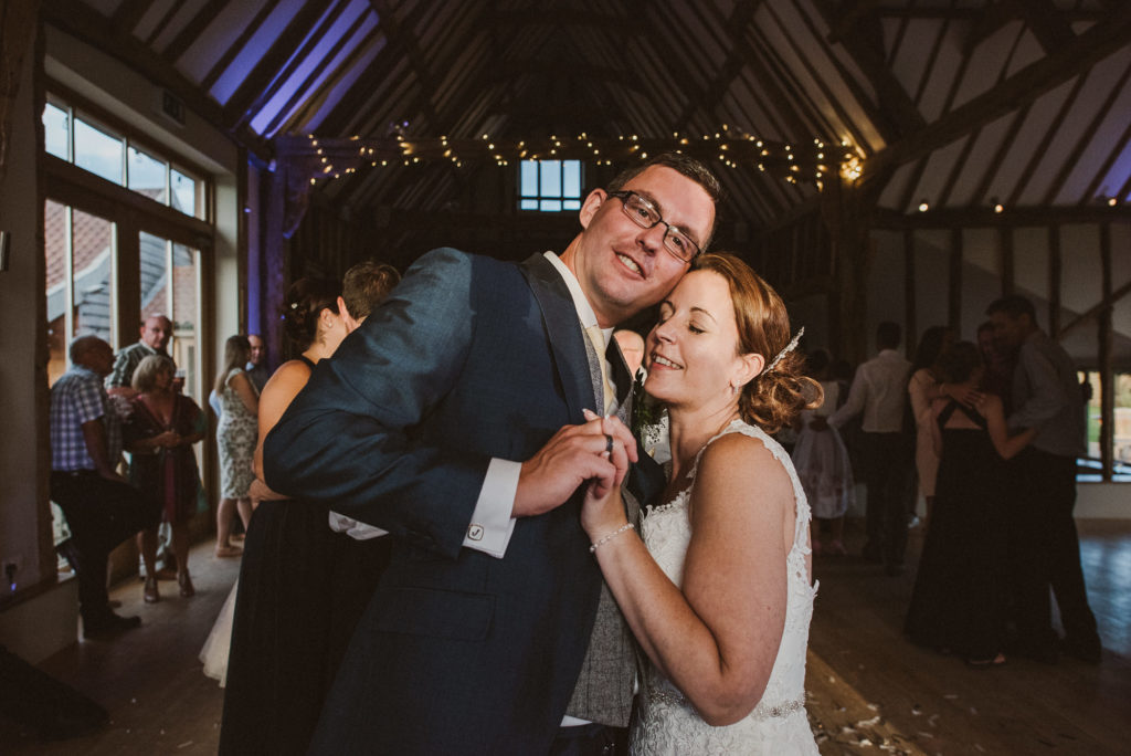 bride and groom are very happy and relaxed during their first dance