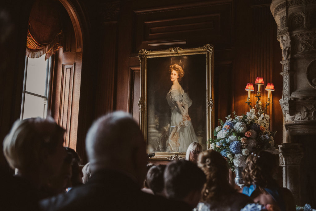 a beautiful painting is displayed on the wall in the Great Hall at Cliveden House
