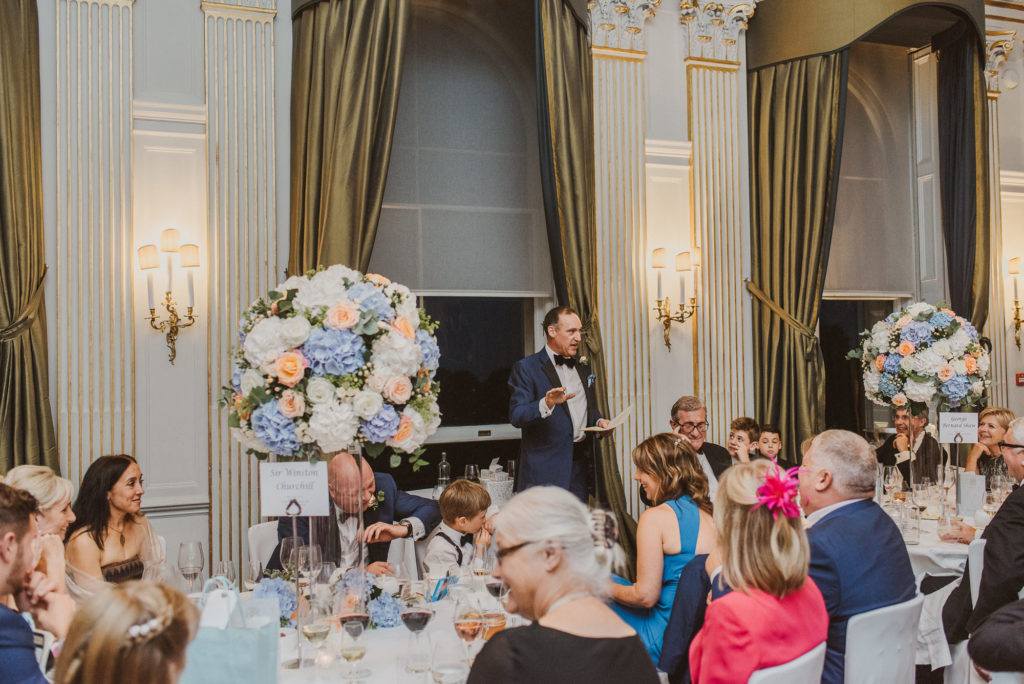 the best man gives a funny speech in the French Dining Room