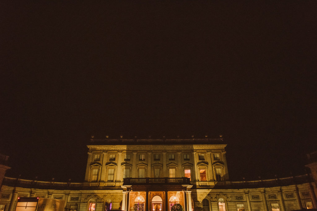 an exterior view of Cliveden House at night